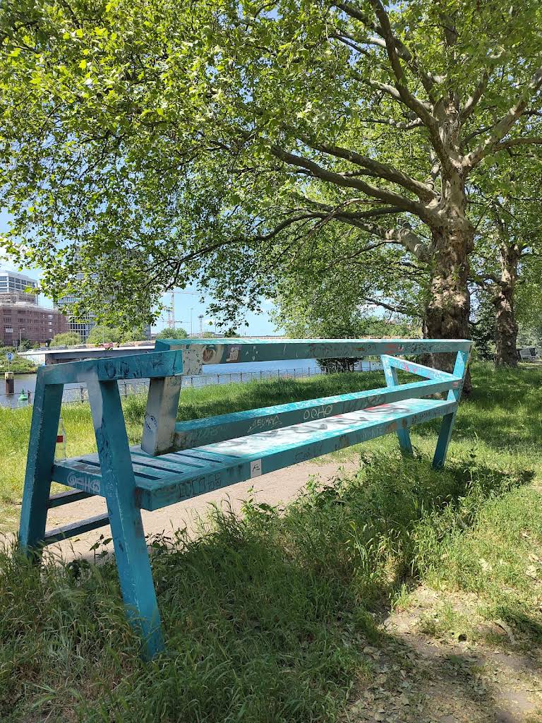 The Big Bench Berlin beside the canal on a sunny day